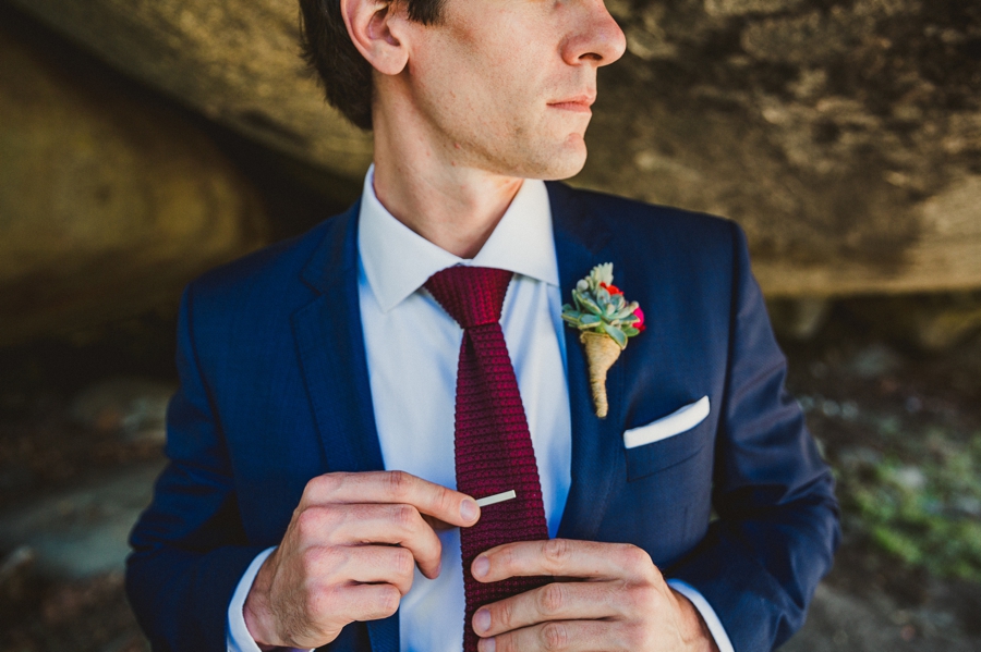 Groom outfit red tie with navy blue suit