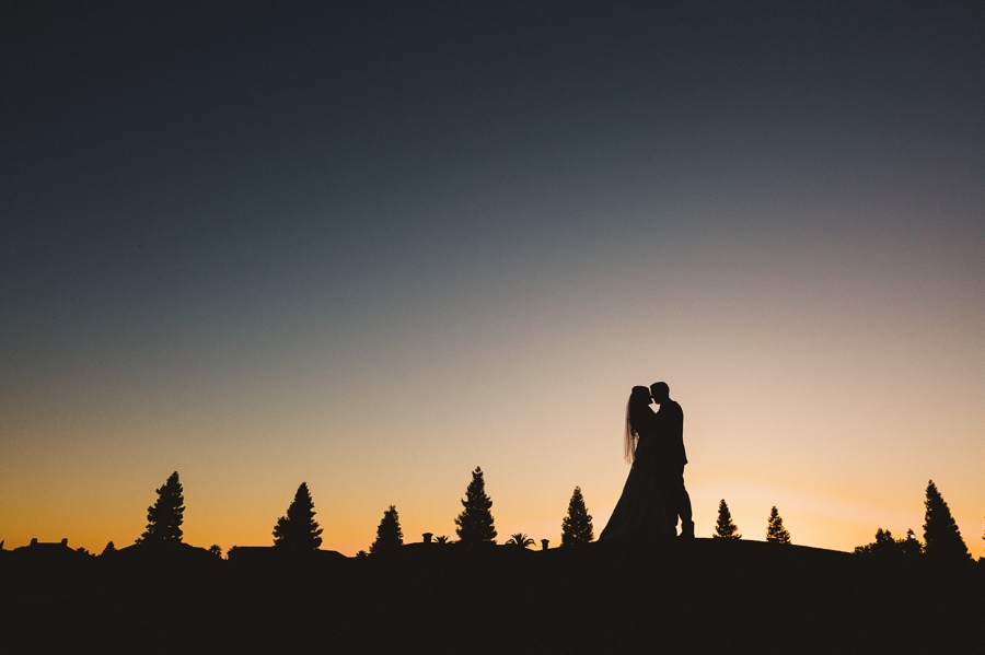 Silhouette sunset wedding portrait